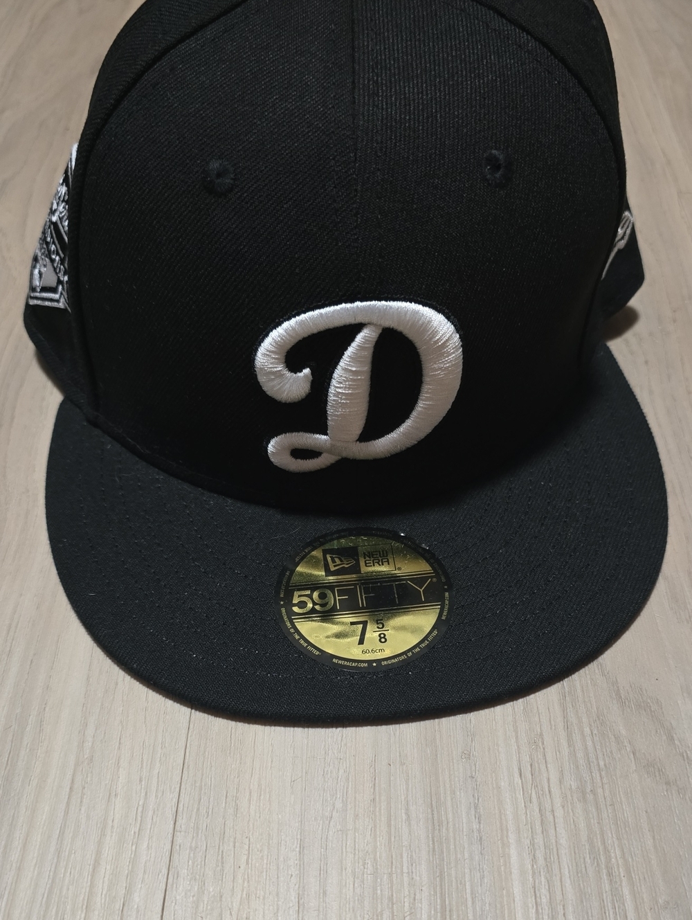 New Era Black Fitted Cap with White 'D' Embroidery